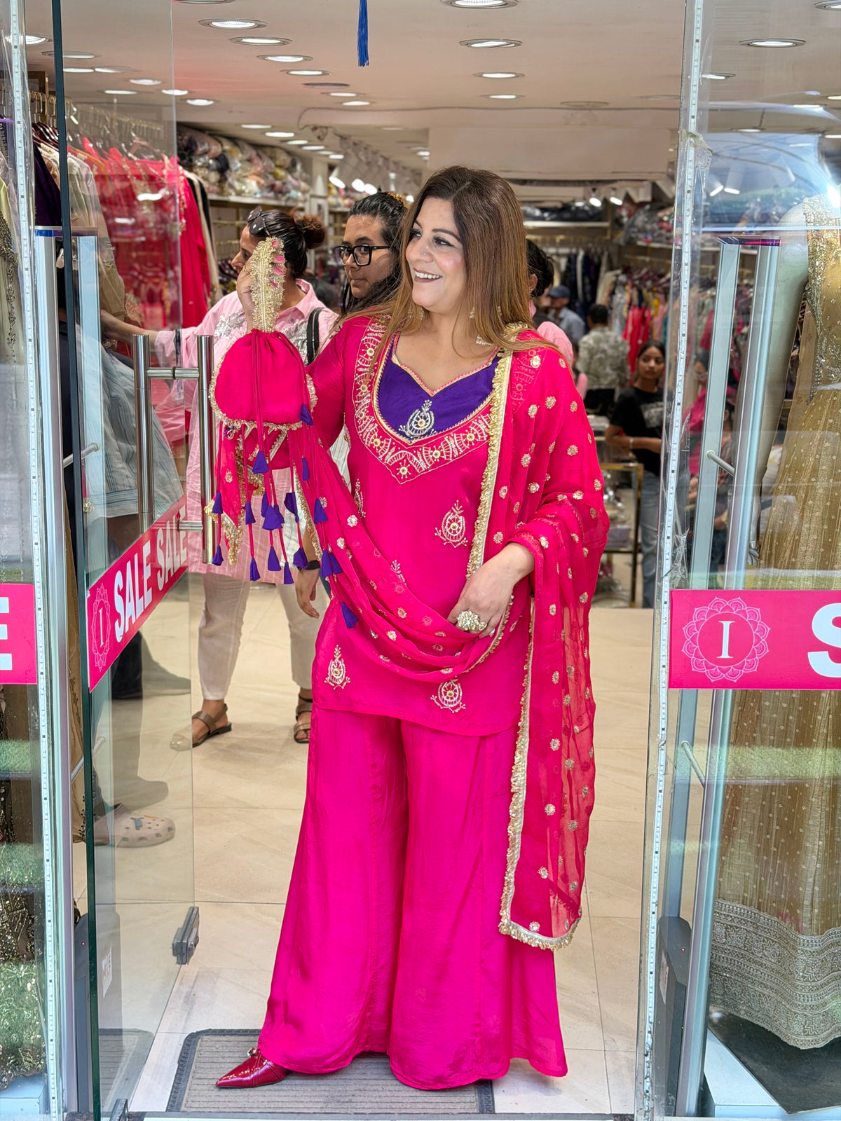 Rani Pink Georgette Suit Set with Contrast Purple Yoke & Matching Potli