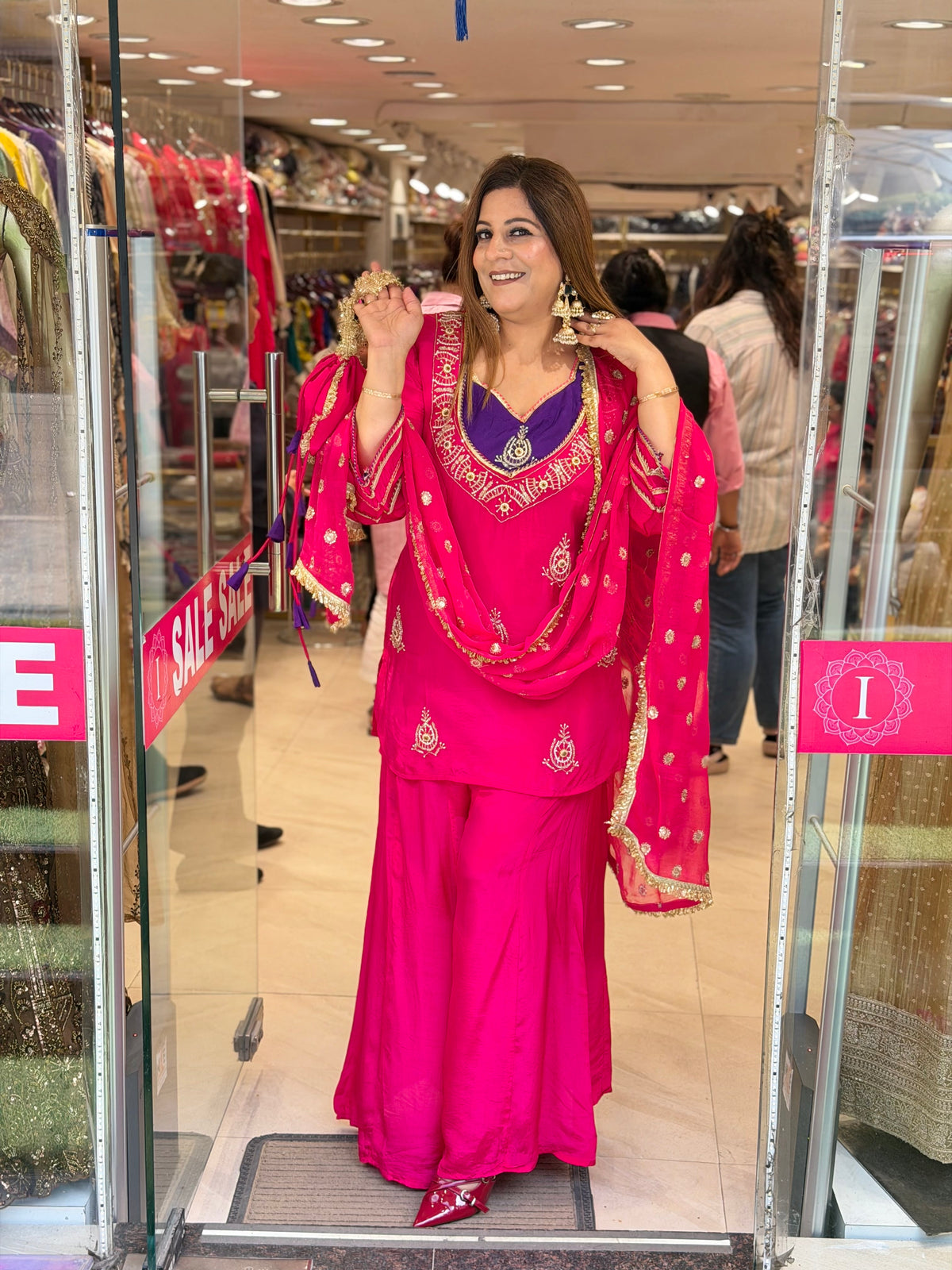 Rani Pink Georgette Suit Set with Contrast Purple Yoke & Matching Potli