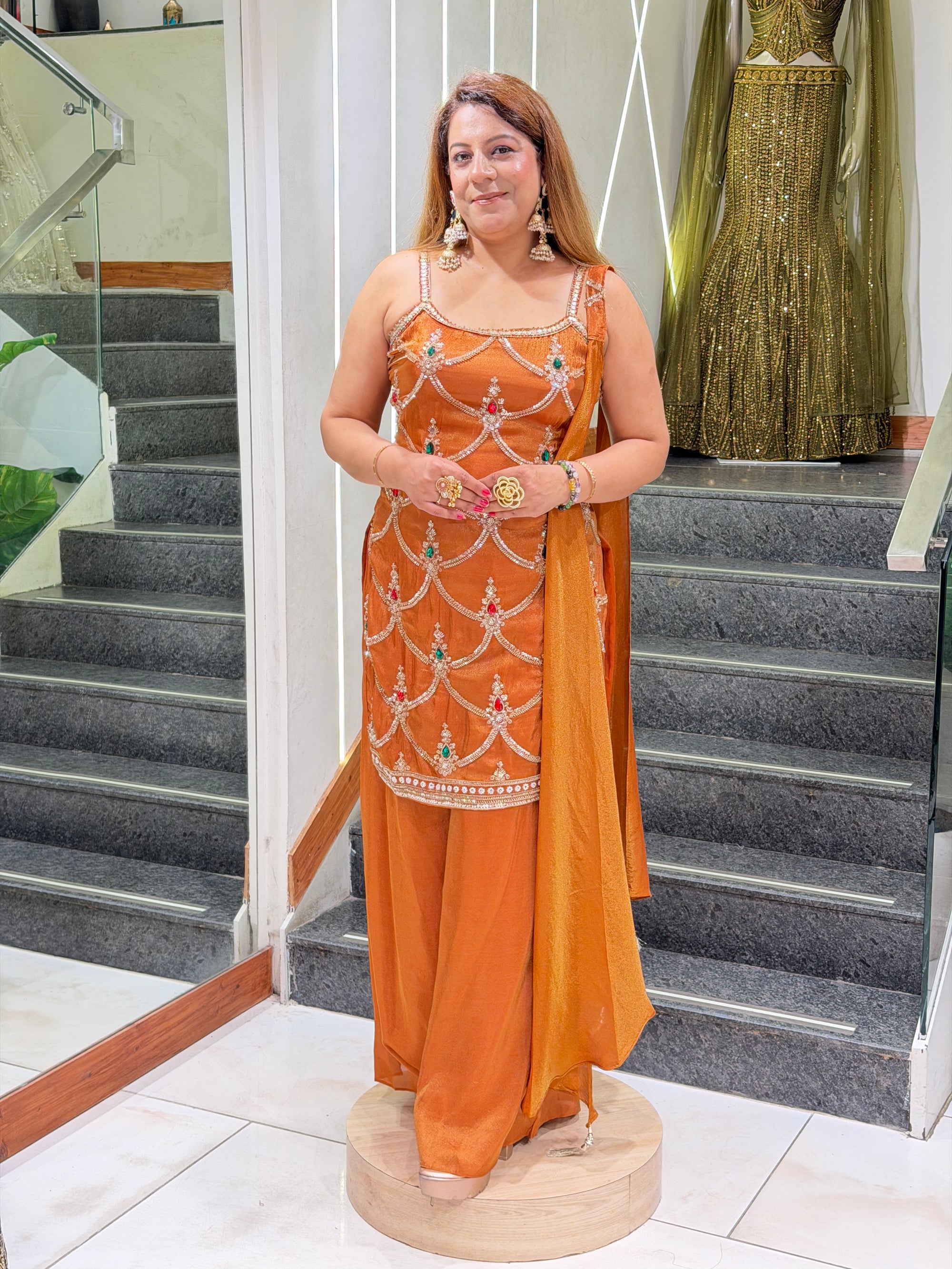 Rust Orange Georgette Strappy Kurti with Embellished Sharara & Dupatta